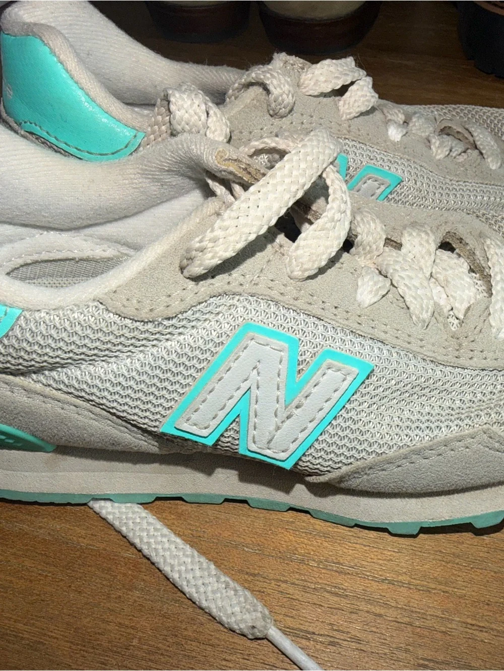 New Balance Women's Beige Sneakers with Teal Accent